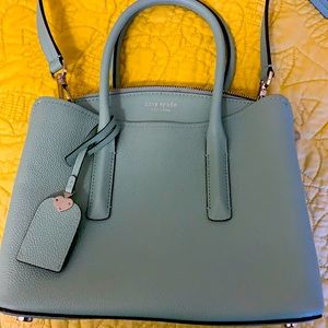 New Kate Spade shoulder bag with attachable crossbody strap.